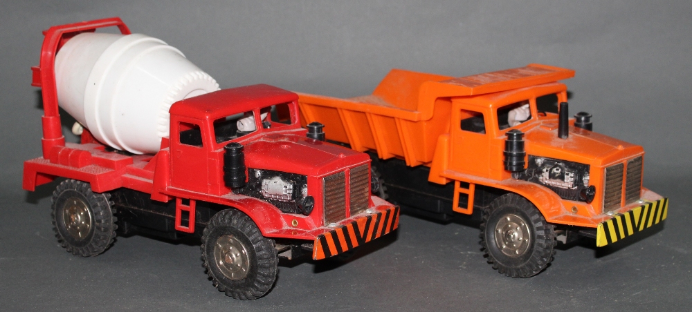 Two plastic Marx trucks,