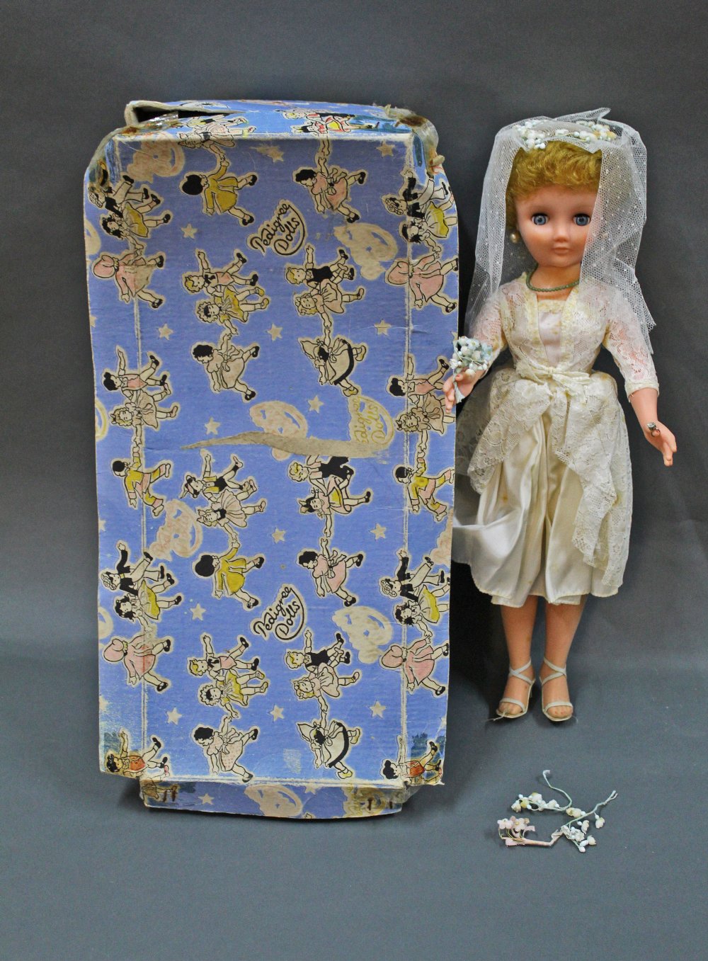 A 1960's boxed Pedigree Teenage Bride doll, measuring 51 cm (20 ins) tall,