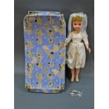 A 1960's boxed Pedigree Teenage Bride doll, measuring 51 cm (20 ins) tall,