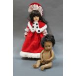 Two 1970's vinyl Sasha baby dolls and a more contemporary porcelain doll in red outfit