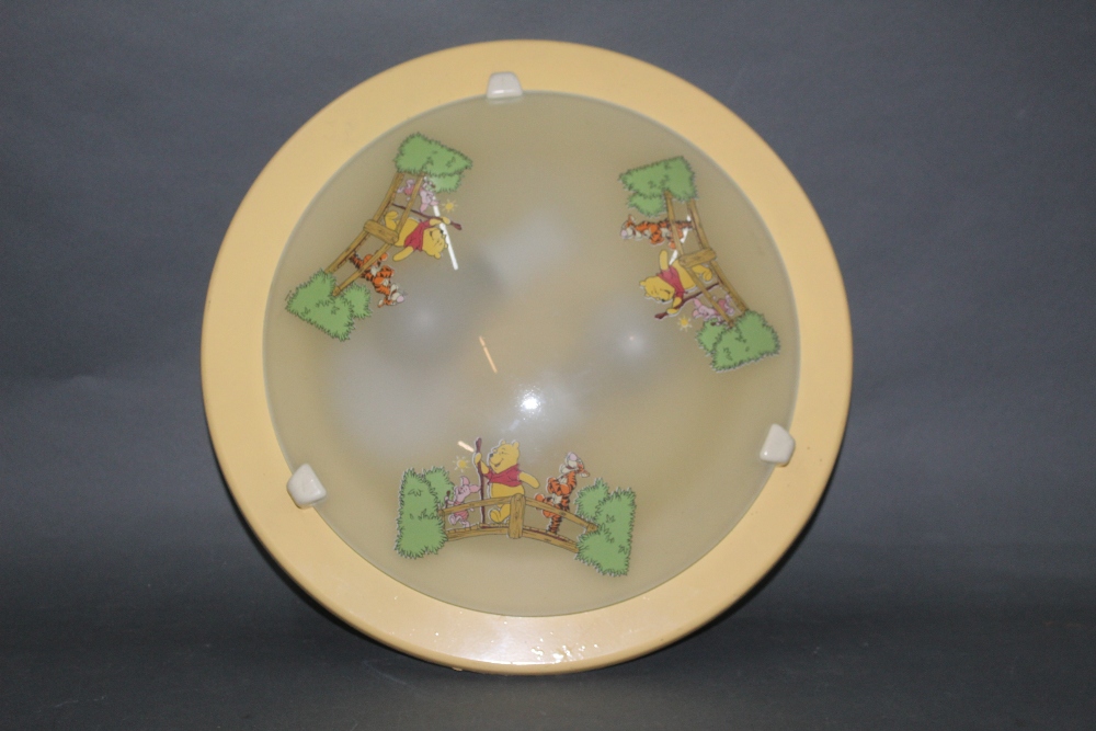 A vintage Winnie the Pooh glass ceiling light fitting, diameter 36 cm.