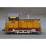 A USA trains G-Scale Union Pacific "Mighty Moe", two Union Pacific cargo vans,