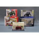 A group lot of boxed agricultural diecast model vehicle, comprising Britain's,