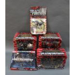 A group lot of Hasbro Transformers toys, comprising a Revenge of the Fallen Master of Metallikato,