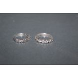 Two silver and CZ set rings, ring sizes M & Q respectively.