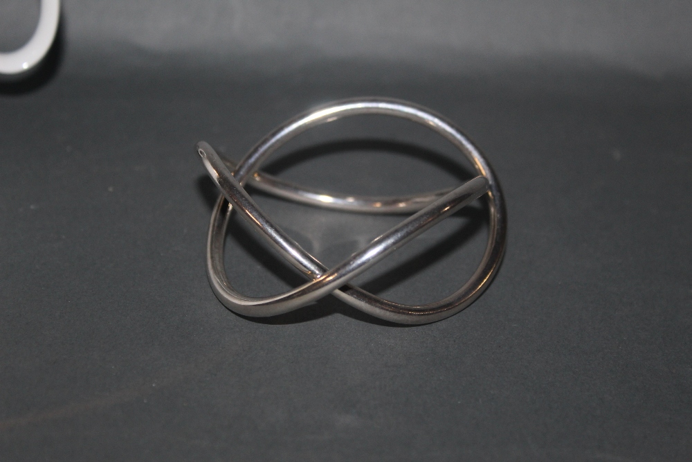 A George Jensen silver Alliance bangle, designed by Allan Scharff, marked 925 and with Jensen stamp,