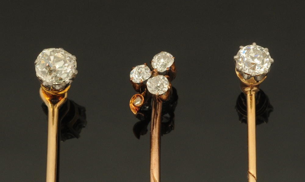 Three gold coloured metal and diamond set stick pins, two set with single stones (0.2 & 0. - Image 3 of 3