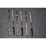 A set of six Elizabeth II silver handled kings pattern pastry forks, the silver handles by H B,