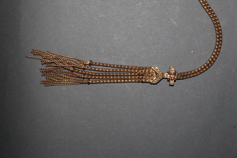 A Vivian Westwood gilt metal necklace of rope twist and tasselled design, with box the same.