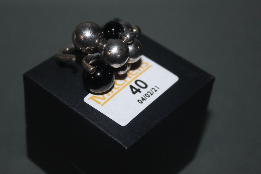 A George Jensen silver and black onyx moonlight grapes ring, marked G J 925S, ring size O.