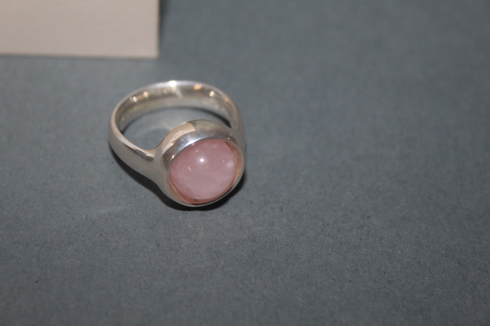 A George Jensen silver and rose quartz set ring with cabochon stone, design number 473, - Image 2 of 2