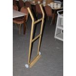 A metal framed trolley or barrow, with n