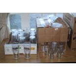 A box of unbranded pint glasses, 48 in t