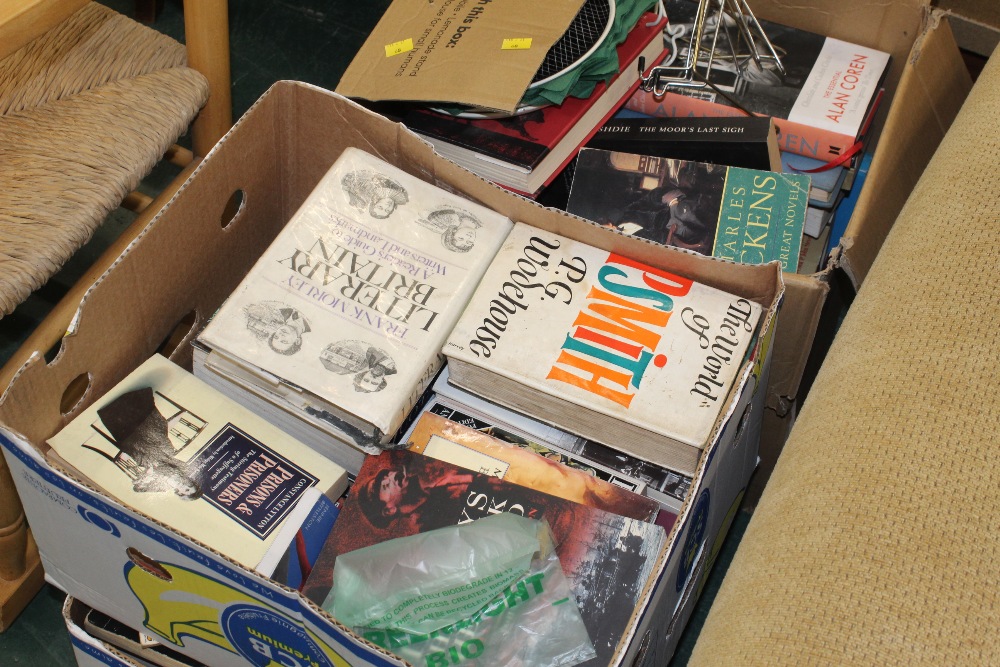 Three boxes of books, to include The Wor