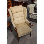 A stained beech wood armchair, upholster