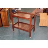 A mahogany two tier trolley, height 86 c