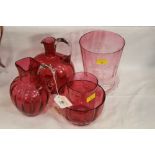 Five pieces of Cranberry glass, shade, 2 jugs,