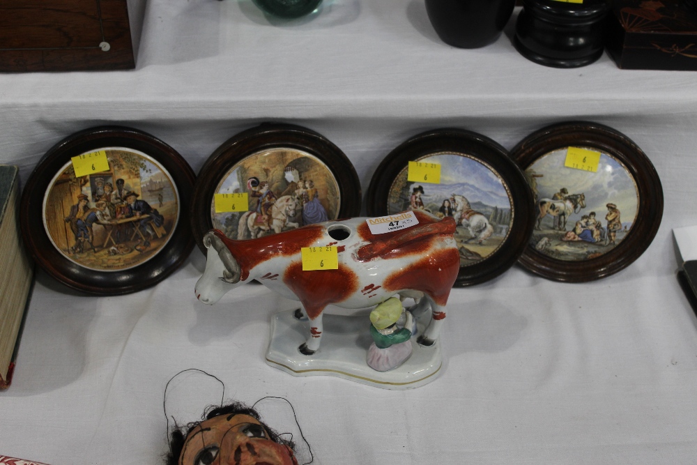 Four Prattware lids in wood frames and a