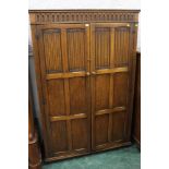 An Old Charm type oak wardrobe with line