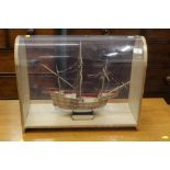 A cased model merchant ship, scale 1:72, case dimensions 53 cm wide,