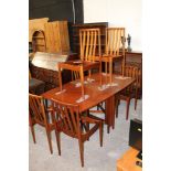 A mid century teak drop leaf table, 150