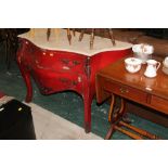 A red bombe two drawer chest of drawers