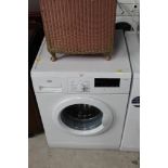 A Logik L814WM16 washing machine