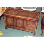 A modern oak three panelled coffer with