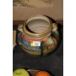 A Studio pottery bulbous two handled vas