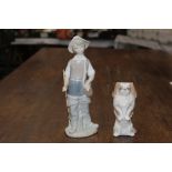 Lladro figurine of a boy fishing and a C