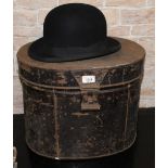 A 19th century ebonised metal oval hat b