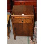 A utility oak bedside cupboard, 42 cm wi