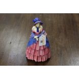 Royal Doulton figurine of a Victorian lady (broken and glued back together)