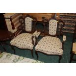 A pair of Edwardian salon chairs with ca