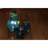 Two Mdina glass paperweights and Mdina b