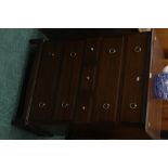 A Stag seven drawer chest of drawers, he