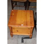 A pine square two tier coffee table, 54