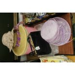 Black ladies handbag, straw hat and two