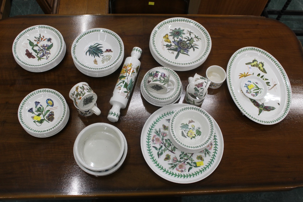 A large collection of Portmeirion Botanic Garden tea plates, dinner plates, bowls, rolling pin,