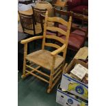 A modern beechwood rocking chair with ru