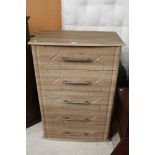 A light oak finish five drawer bedroom c