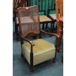 A mahogany and bergere low armchair