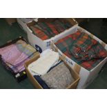 Four boxes of cushions, tartan curtains