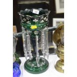 An early 19th century green glass lustre