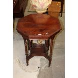 An Edwardian octagonal mahogany two tier