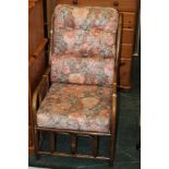 A conservatory armchair with bergere sid