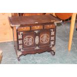 A Chinese cabinet, with brass metal deco