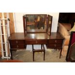 A stag mahogany dressing table and stool