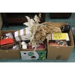 Three boxes of artificial flowers, tins,