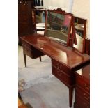 A modern mahogany dressing table with in